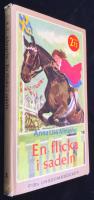 En flicka i sadeln